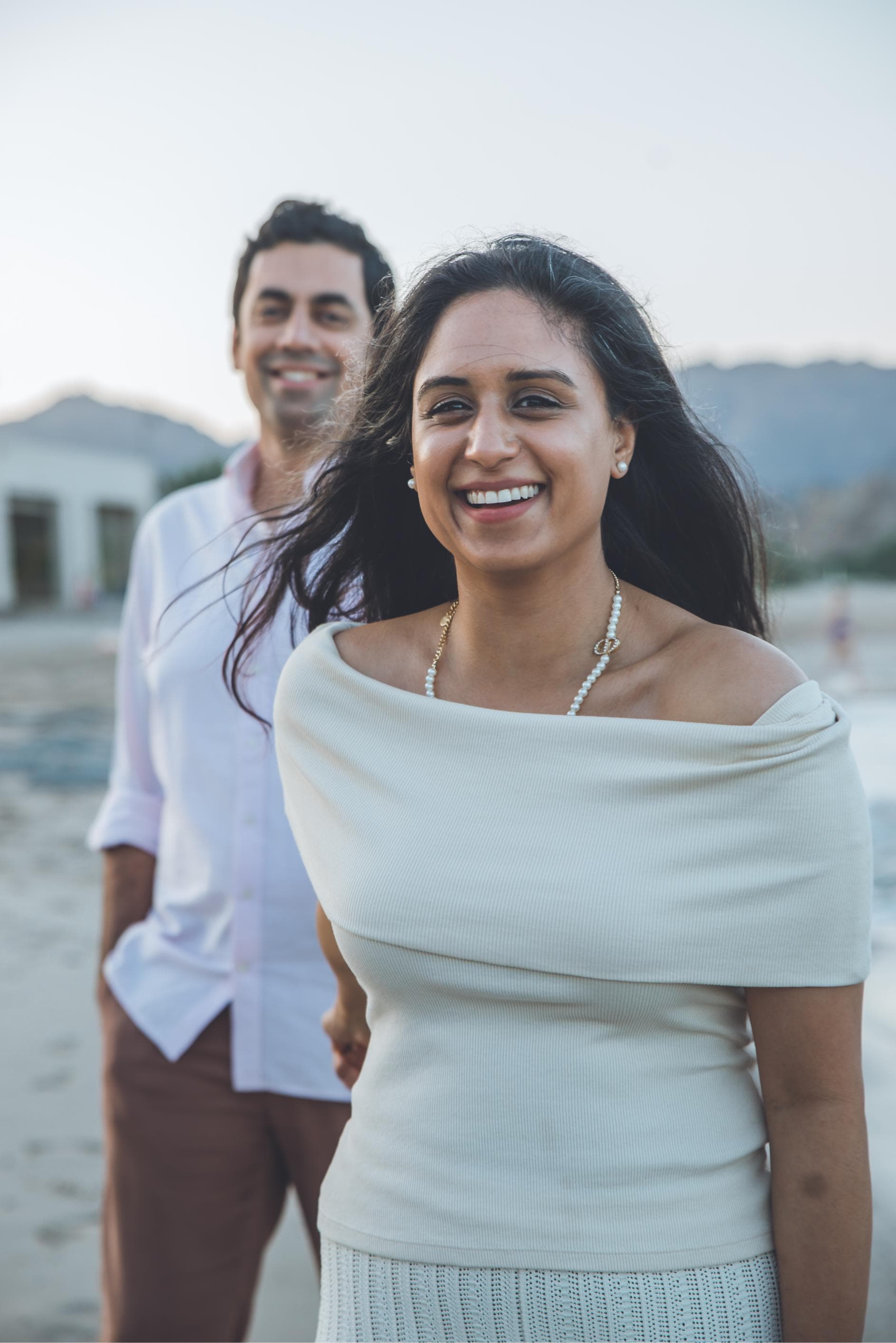 Couple portrait session at golden hour, resort area Muscat